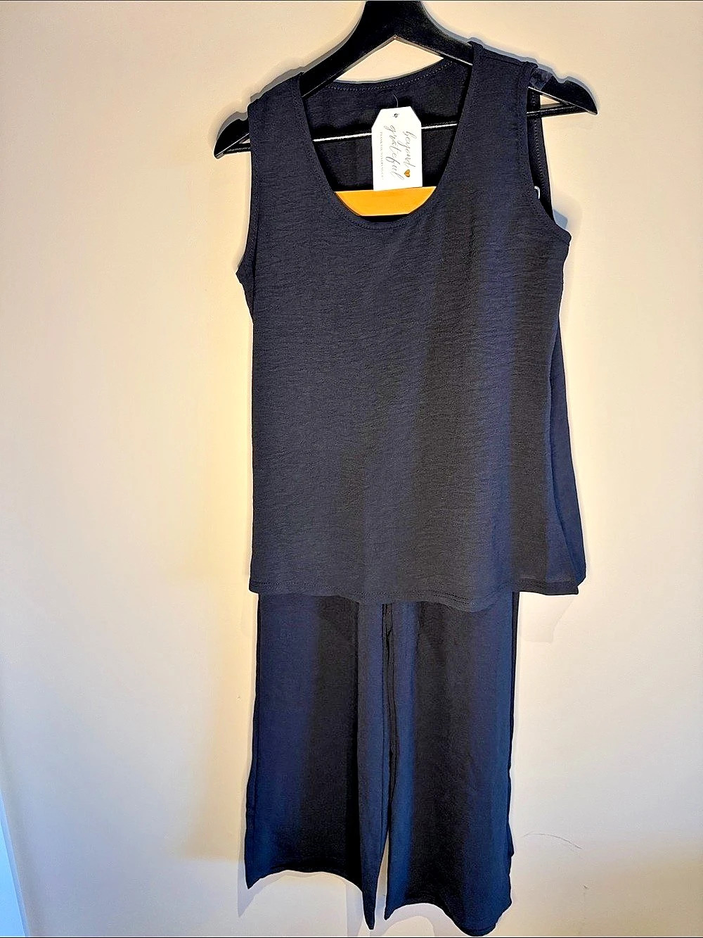 Black Wide-Leg Jumpsuit Size Medium Like New
TTL 006